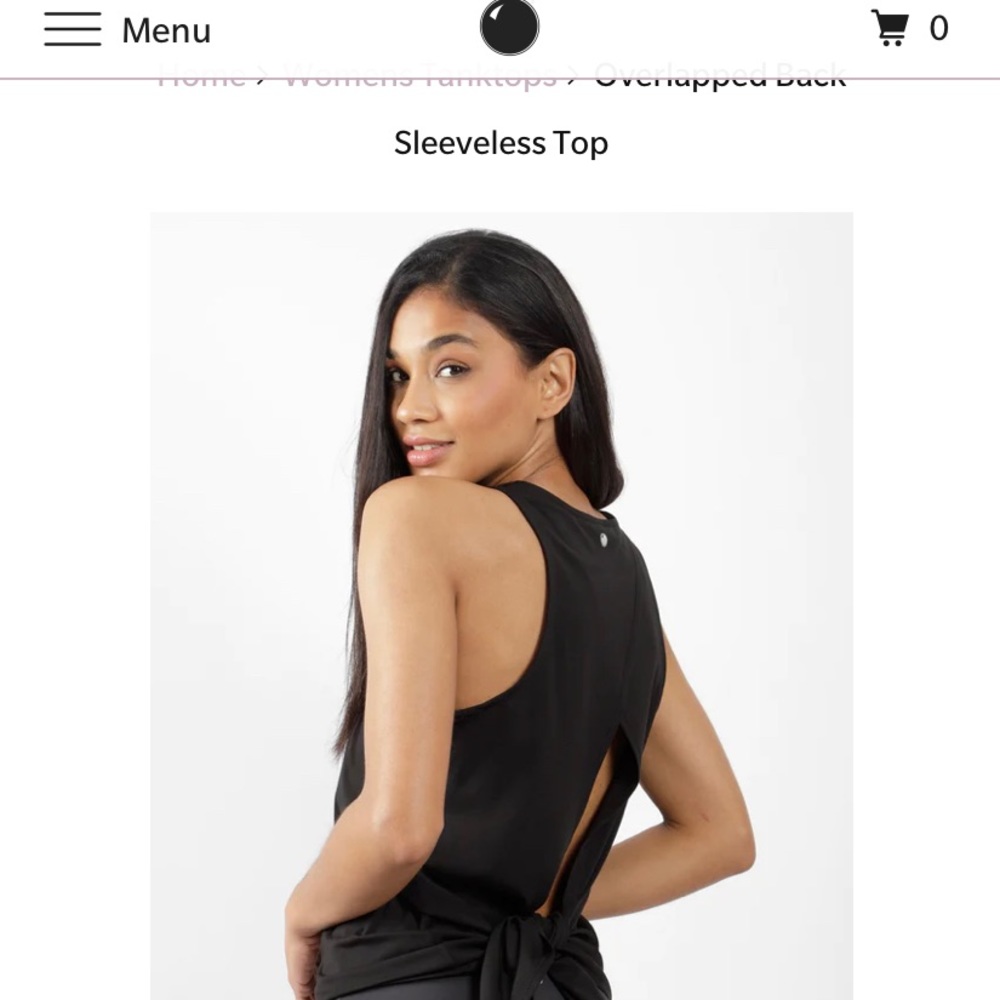yogalicious workout top! open back with option to tie. size small! worn twice!
